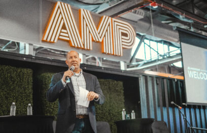 CEO Mike Reynolds welcoming founders and tech leaders to Innovatemap's event at The AMP in Indianapolis.